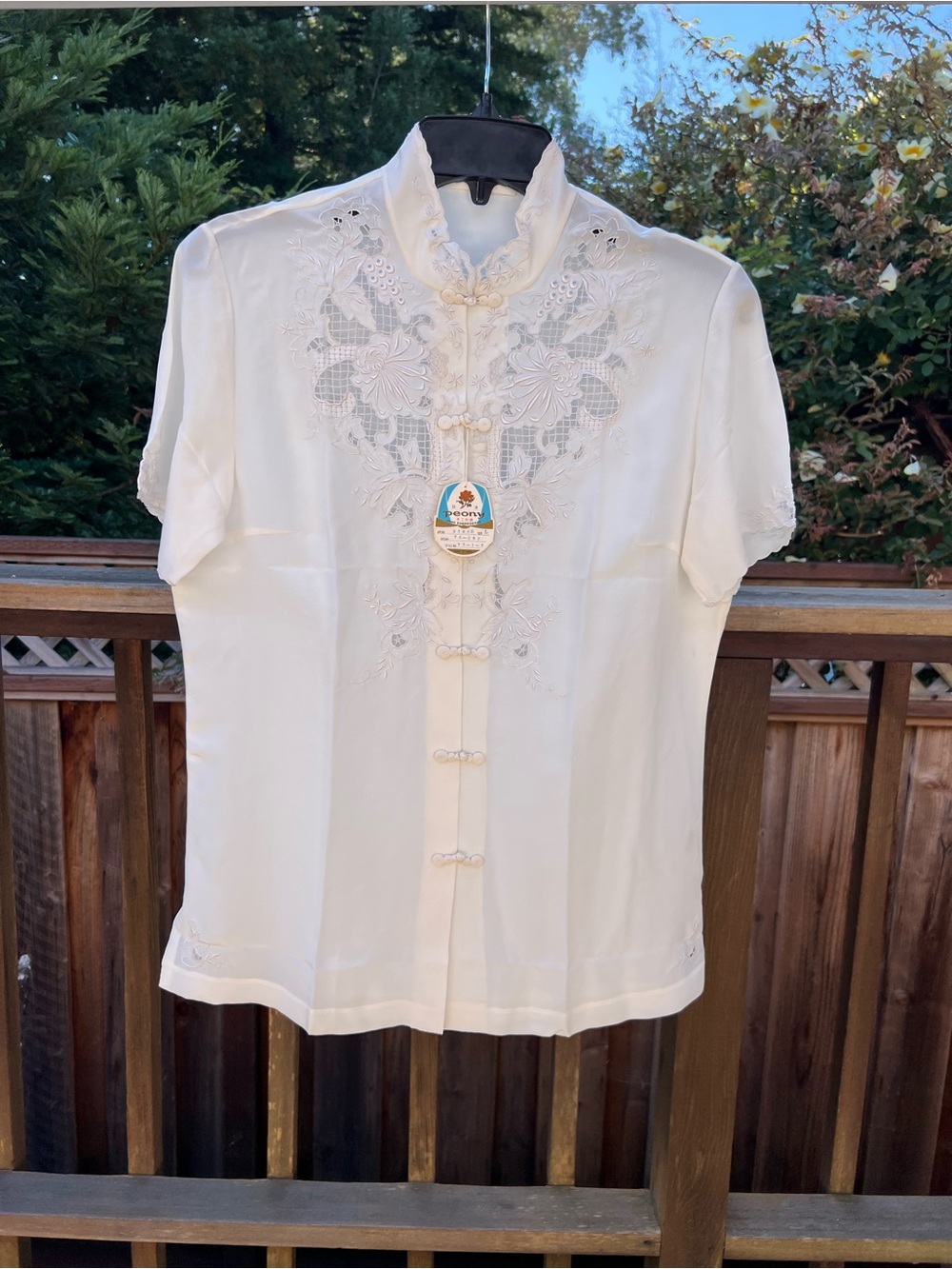 Vintage 100% Silk handmade
White Embroidered Button-Up
Blouse